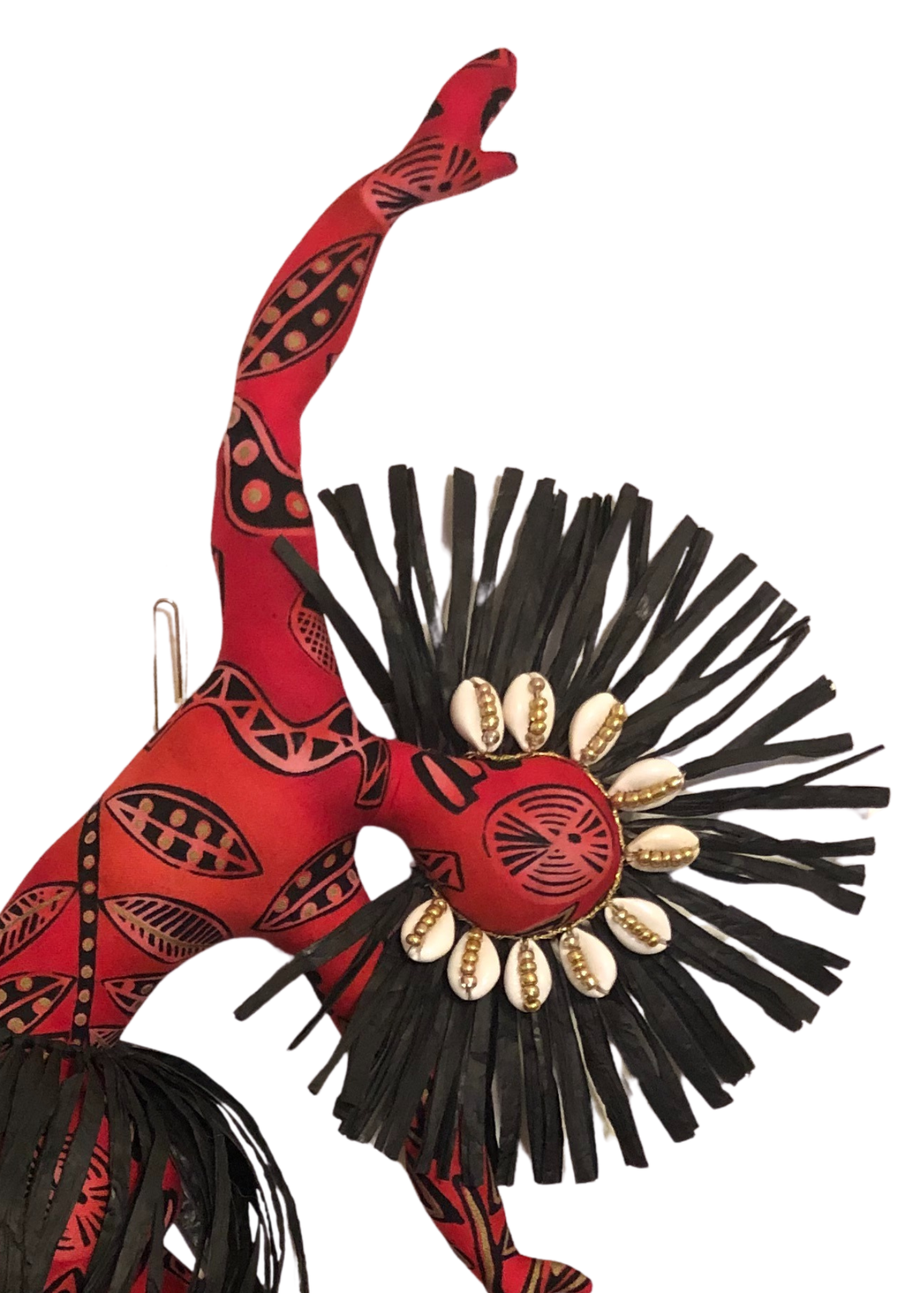 Matna Spirit Dancer wall décor doll pair in red and black African print with raffia crowns, cowrie shells, and symbolic beaded details.